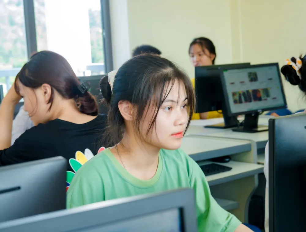 Students learning at PISDT